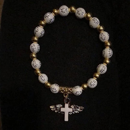 Delicate Wing Shaped Cross Necklace