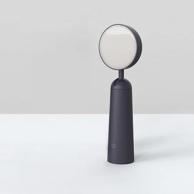 Sleek Black Desk Lamp with Gold Details