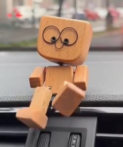 Handcrafted Wooden Rocking Figure with Changeable Faces