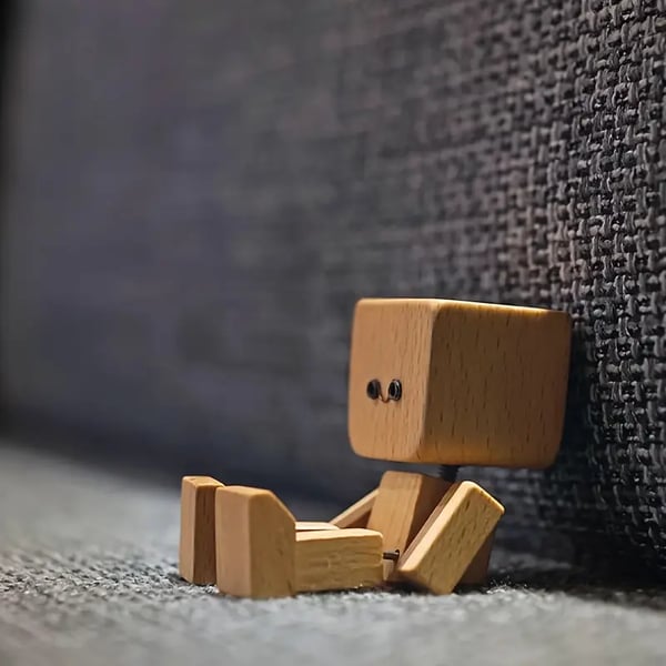 Handcrafted Wooden Rocking Figure with Changeable Faces
