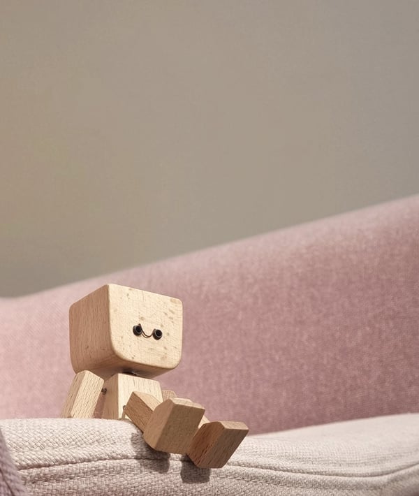 Handcrafted Wooden Rocking Figure with Changeable Faces