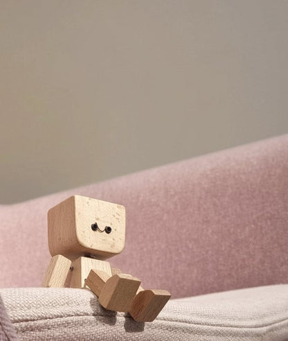 Handcrafted Wooden Rocking Figure with Changeable Faces